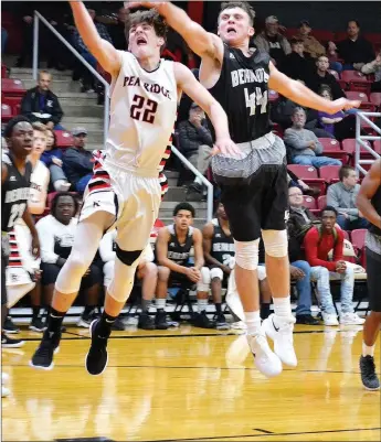  ?? TIMES photograph by Annette Beard ?? Blackhawk senior Hayden Holtgrewe led a balanced scoresheet for Pea Ridge with 19 points Friday night.