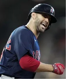  ?? Ap ?? GETTING IT STARTED: J.D. Martinez celebrates his grand slam in the first inning on Saturday.