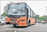  ?? HT PHOTO ?? When the speeding cluster bus (above) hit the car (top) on the passenger side, the i10 was pushed sideways into a DTC bus on its other side. The accident took place in northeast Delhi's Nand Nagri area on Tuesday.