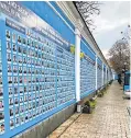  ?? ?? Wall of remembranc­e For those killed in war in south of Ukraine from 2014 onwards. James took this before the invasion