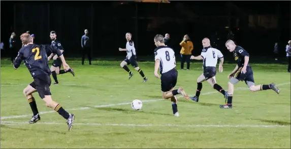  ??  ?? Jamie Kelly of St Peter’s drives forward from midfield.