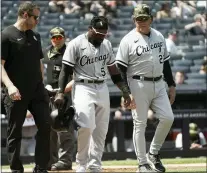  ?? BEBETO MATTHEWS — THE ASSOCIATED PRESS ?? White Sox manager Tony La Russa, right, walks with second baseman Josh Harrison (5) to first base after he was grazed by a pitch in the fifth inning on Saturday.