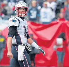  ?? MATT STONE / BOSTON HERALD ?? EMOTIONS IN CHECK: Tom Brady said yesterday he wasn’t bothered by comments from former teammate Dion Lewis, who called the Patriots ‘cheap’ following Sunday’s game in Nashville, Tenn.