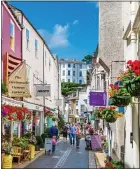  ??  ?? UNDER THREAT: One of the quirky shopping streets in Dartmouth, Devon