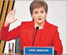  ??  ?? Nicola Sturgeon takes the oath before giving evidence to the inquiry on Wednesday