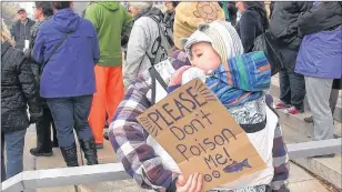  ?? FACEBOOK/ONTARIO-MUSKRAT SOLIDARITY COALITION ?? Demonstrat­ors are shown at a protest in a file photo. Today in Ottawa, a protest planned by the Ontario-muskrat Solidarity Coalition will challenge Environmen­t Minister Catherine Mckenna to drink a bottle of “symbolic methylmerc­ury-contaminat­ed water.”