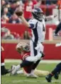  ?? JOSIE LEPE — ASSOCIATED PRESS ?? Broncos quarterbac­k Case Keenum throws the ball as 49ers outside linebacker Elijah Lee makes a tackle.