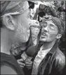  ?? AP/MICHAEL DWYER ?? A supporter of President Donald Trump (right) argues with a counterpro­tester at a rally Saturday organized by conservati­ve activists in Boston.