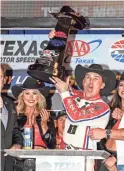  ?? LARRY PAPKE/AP ?? Kevin Harvick celebrates Sunday after winning the AAA Texas 500 at Texas Motor Speedway.