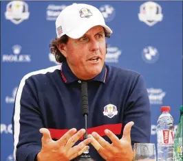  ?? CHRISTIAN PETERSEN / GETTY IMAGES ?? Phil Mickelson, 48, is the oldest player on the U.S. Ryder Cup team. The event begins Friday in Paris at Le Golf National.