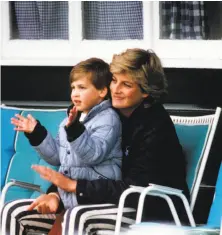  ?? HBO ?? Prince William sits on his mother’s lap in a photo that is shown on the HBO film about Princess Diana.