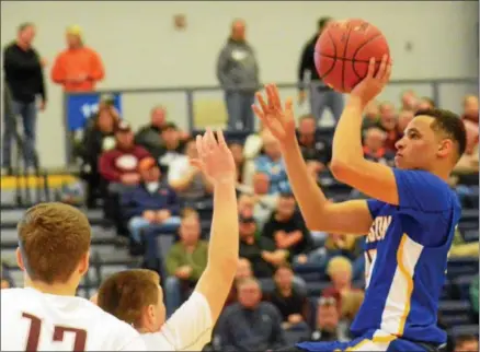  ?? JOHN BREWER - ONEIDA DAILY DISPATCH ?? Madison’s Sam Matteson rises up for a shot attempt against Oriskany during Saturday’s Section III Class D semifinal contest.