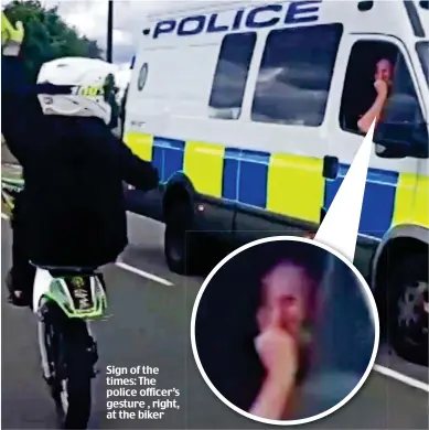  ??  ?? Sign of the times: The police officer’s gesture , right, at the biker