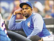  ?? Frank Franklin II / Associated Press ?? Yoenis Cespedes’ base salary for next season was cut to $6 million from its original $29.5 million as part of an amended contract with the New York Mets.