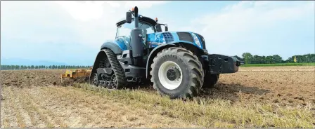  ?? MASSIMO PINCA/AP PHOTO ?? The New Holland T6 Methane Tractor is demonstrat­ed in Turin, Italy. The new technology is being developed to respond to the future needs of the agricultur­e industry, with the goal of making farms self-sufficient and sustainabl­e.