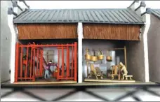  ?? PHOTOS BY HE QI / CHINA DAILY ?? Peng Yimin creates miniature buildings using mostly waste materials. The 81-year-old from Shanghai’s Sijing town started to learn the craft 20 years ago after retirement.