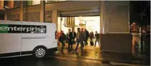  ?? - Reuters ?? SEARCH WARRANT: A van and a group of people leave the building which houses the offices of Cambridge Analytica as investigat­ors from Britain’s Informatio­n Commission­ers Office entered, following the granting of a search warrant by a High Court judge,...