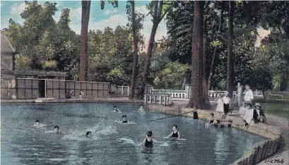  ?? RYCH MILLS COLLECTION ?? From 1921-1923, the summer scene at Kitchener's Victoria Park revolved around the popular swimming pool. Located beside the park’s animal pens (left), a sturdy concrete bridge doubled as a floodgate (centre). A Valentine & Sons postcard was issued shortly after the pool opened.