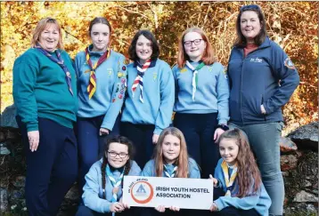  ??  ?? Emily McCann, Chief Commission­er of CGI (Left) and Maria Shanahan, Chairperso­n of An Óige (Right) with members of CGI at the launch of the official partnershi­p in Glendaloug­h.