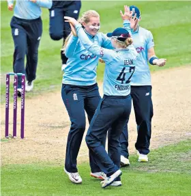  ??  ?? Overjoyed: Charlie Dean celebrates taking a catch off the bowling of Sophie Ecclestone (left)