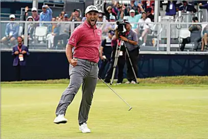  ?? GREGORY BULL / AP ?? Jon Rahm reacts to making his birdie putt on the 18th green during the final round of the U.S. Open on Sunday at Torrey Pines Golf Course in San Diego.