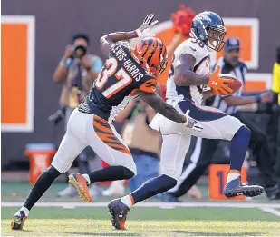  ?? GARY LANDERS/ASSOCIATED PRESS ?? Broncos wide receiver Demaryius Thomas (88) breaks away from Cincinnati cornerback Chris Lewis-Harris during Sunday’s game.