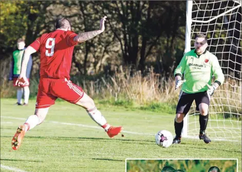  ?? Photos: Stephen Lawson ?? Donald Campbell slots home Saints’ first goal against Rutherglen during last Saturday’s SAFL Premier Division match at Glencruitt­en.