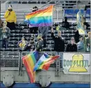  ?? JANE TYSKA — STAFF ARCHIVES ?? Fans wave rainbow flags during the Oakland Athletics Pride game against the Texas Rangers at the Coliseum in Oakland in 2016. The team’s Pride Night returns on Friday.