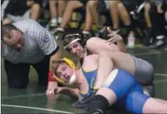  ?? STAN HUDY - THE SARATOGIAN ?? Queensbury’s Shawn Stimpson looks at a loss in the grasp of Shenendeho­wa’s Harry Gould in the opening round 182-pound match Tuesday night during the Section 2 Dual Championsh­ip semifinal in Clifton Park.