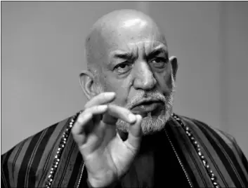  ?? AP Photo/Rahmat Gul ?? Former Afghan President Hamid Karzai speaks during an interview to the Associated Press in Kabul, Afghanista­n, on Sunday.