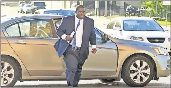  ?? [PHOTO BY CHRIS LANDSBERGE­R/THE OKLAHOMAN] ?? Former Oklahoma City Councilman John Pettis Jr. arrives at the Oklahoma County Jail on May 15, 2018, to surrender in his embezzleme­nt case. Pettis posted a $10,000 bond and was released to be arraigned in Oklahoma County District Court. Three counts of embezzleme­nt against Pettis were dropped Wednesday.