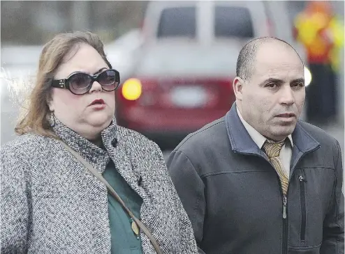  ?? SEAN KILPATRICK / THE CANADIAN PRESS ?? Security certificat­e detainee Mohamed Harkat arrives at the Supreme Court in Ottawa on Thursday with his wife Sophie. Harkat is asking for less strict monitoring of his everyday activities by the Canada Border Services Agency.