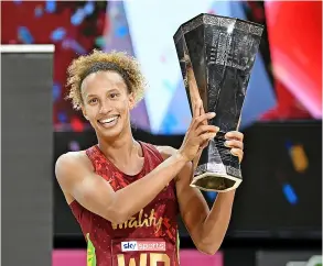  ?? Picture: Kai Schwoerer/getty Images ?? England Roses captain Serena Guthrie lifts the Taini Jamison Trophy after winning the Cadbury Internatio­nal Series against the New Zealand Silver Ferns last month in New Zealand