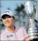  ?? PICTURE: AP ?? Lydia Ko with the Evian Championsh­ip trophy after her victory on Sunday.