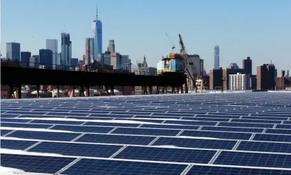  ??  ?? Solar photovolta­ics at Brooklyn Navy Yard, an industrial complex in New York. The panel installati­on received incentives from the New York State Energy Research and Developmen­t Authority. Photograph: Mark Lennihan/AP