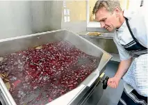  ??  ?? BV Gourmet second chef Chris Pearce makes pickled beetroot for harvest meals.