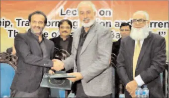  ?? -APP ?? Managing Director Pakistan Bait ul Mal Aon Abbas Buppi and VC Bahauddin Zakria University, Dr. Mansoor Akbar exchanging the MoU documents regarding financial support to the deserving students.