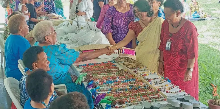  ?? Salote Qalubau ?? The Assistant Minister for Women ,Children and Poverty Alleviatio­n meets wiith various women artisans during the Western Division Womens Expo at the Shirley Park in Lautoka on May 3, 2023. Photo: