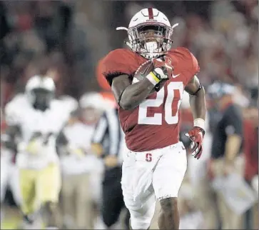  ?? Mathew Sumner ?? FRESHMAN running back Bryce Love scores for Stanford on a 93-yard pass play against Central Florida.