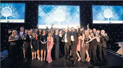  ??  ?? CELEBRATIN­G SUCCESS: The winners of the 2015 Scottish Family Business Awards enjoy their moment in the spotlight at last year’s dinner.