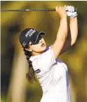  ?? MICHAEL REAVES GETTY IMAGES ?? Sei-young Kim plays a shot on the 18th hole in Saturday’s third round of the CME Group Tour Championsh­ip.