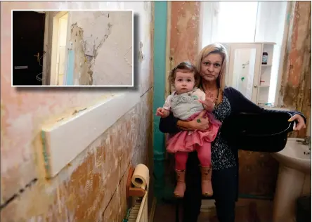  ??  ?? Karen Wilson and her daughter Layla at their flat in Possil, which Karen says is not fit for the child to live in