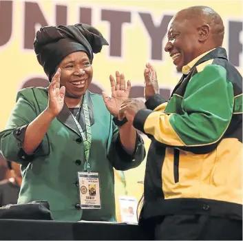  ?? Picture: Alaister Russell ?? Nkosazana Dlamini-Zuma and Cyril Ramaphosa share a moment at the ANC’s elective conference.