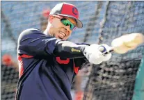  ?? AP PHOTO ?? Cleveland Indians’ Michael Brantley warms up before batting practice dur-