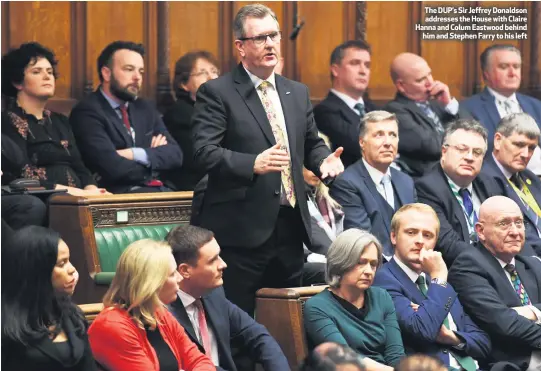  ??  ?? The DUP’s Sir Jeffrey Donaldson addresses the House with Claire Hanna and Colum Eastwood behind
him and Stephen Farry to his left