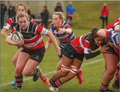  ??  ?? Karen Douglas carries for Wicklow against Blackrock College.