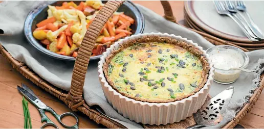  ?? NICOLA GALLOWAY ?? This spring greens with ricotta quiche is seasonal cooking at its best.