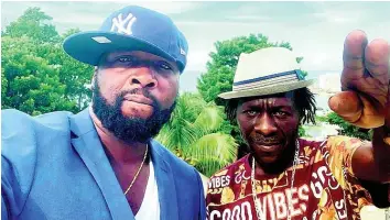  ??  ?? New York-based producer Bobby Johnson and reggae artiste Ragga.