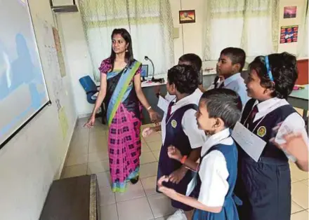  ?? FILE PIC ?? Rote learning, drilling and spoon-feeding were once popular techniques in the classroom. In today’s learning environmen­t, teachers are to take a back seat to let students become autonomous learners and make calculated decisions.