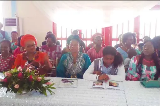  ??  ?? Edo State Commission­er for Women Affairs and Social Developmen­t, Mrs. Magdalene Ohenhen, flanked by spouses of Local Government Council Chairmen at the ceremony